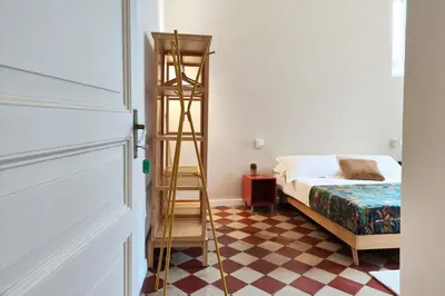 Letto o letti in una camera di Casa Marlene