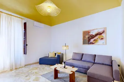 Area soggiorno di Casa Vacanza da Zero - Terrazza Etna a 5' dal Mare