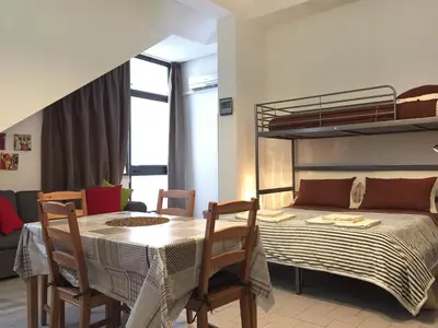 Letto o letti in una camera di Zafferana Lavica Apartment