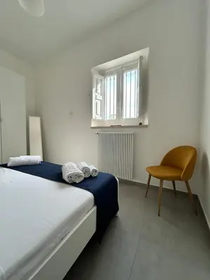 Letto o letti in una camera di Sunshine Apartment Acireale