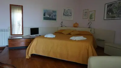 Letto o letti in una camera di La Cittadella Residence Città Universitaria Policlinico Catania