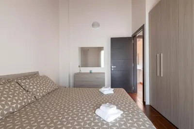Letto o letti in una camera di SAVOIA 173 - Apartment