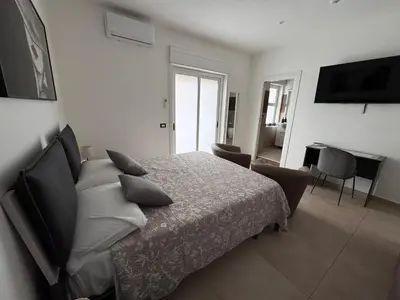 Letto o letti in una camera di Umberto Home 303