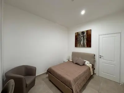 Letto o letti in una camera di Umberto Home 303