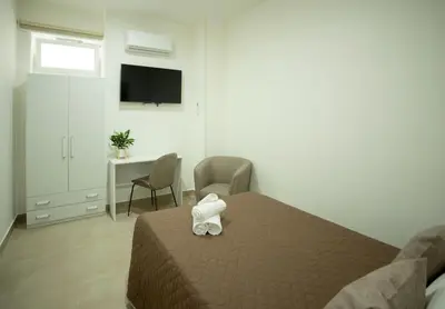 Letto o letti in una camera di Umberto Home 303