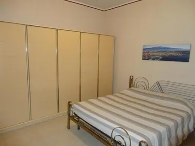 Letto o letti in una camera di Casa delle Pomelie - Taormina & Etna Panoramic Views