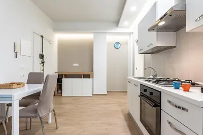 Cucina o angolo cottura di GuestHost - Lovely Apartments in Borgo Sanzio - M Giuffrida&Italia