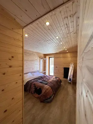 Letto o letti in una camera di Etna Chalet Nicolosi