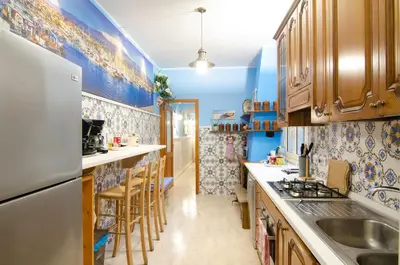 Cucina o angolo cottura di Casa delle Zammare Fronte mare centro storico
