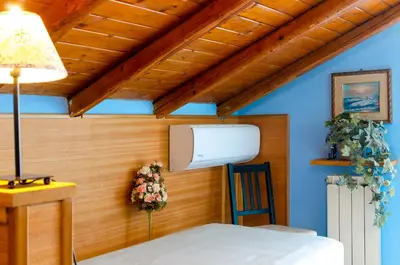 Letto o letti in una camera di Casa delle Zammare Fronte mare centro storico