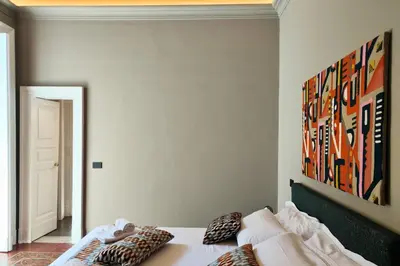 Letto o letti in una camera di L'Opificio Siciliano Boutique Apartments