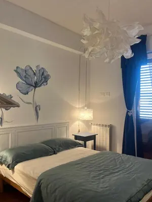 Letto o letti in una camera di Casa Malù