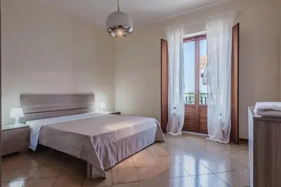 Letto o letti in una camera di Spacious Apartment with Sea View in Aci Castello