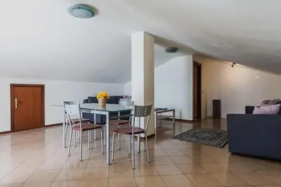 Area soggiorno di Spacious Apartment with Sea View in Aci Castello