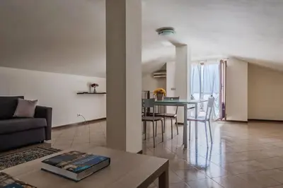 Area soggiorno di Spacious Apartment with Sea View in Aci Castello
