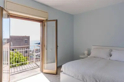 Letto o letti in una camera di Oasi Azzurra Seaview by Wonderful Italy