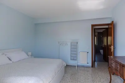 Letto o letti in una camera di Oasi Azzurra Seaview by Wonderful Italy