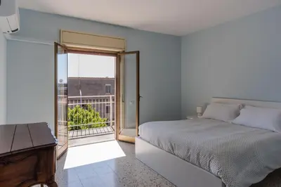 Letto o letti in una camera di Oasi Azzurra Seaview by Wonderful Italy
