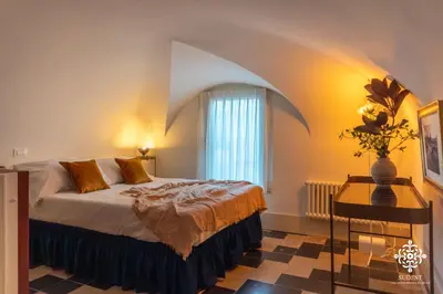 Letto o letti in una camera di Umberto Charming Home - Elegante dimora in centro