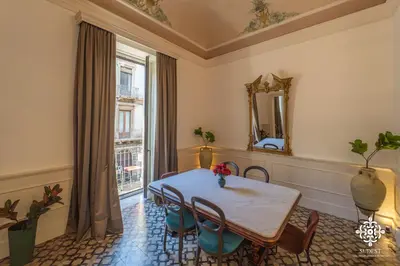 Area soggiorno di Umberto Charming Home - Elegante dimora in centro