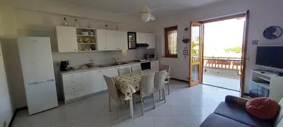 Cucina o angolo cottura di Riposto Sea & Etna View Retreat