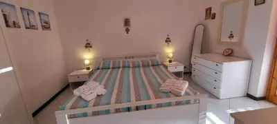 Letto o letti in una camera di Riposto Sea & Etna View Retreat