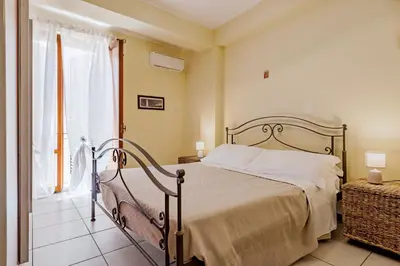 Letto o letti in una camera di Terrazza da sogno sul mare