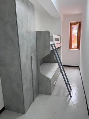 Letto o letti a castello in una camera di Casa a mare Sant'Anna