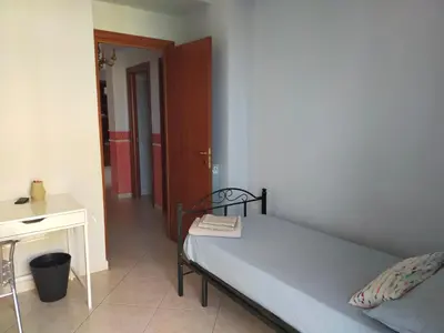 Letto o letti in una camera di Etna House