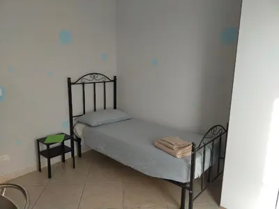 Letto o letti in una camera di Etna House