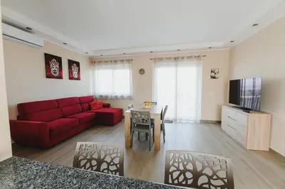 TV o dispositivi per l'intrattenimento presso Casa Etna e Waves