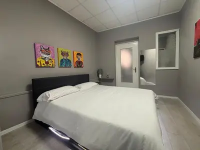 Letto o letti in una camera di Casa Rita Standard Room