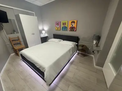 Letto o letti in una camera di Casa Rita Standard Room