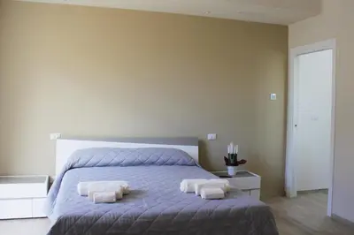 Letto o letti in una camera di Sipala Home Appartamento Acireale Centro