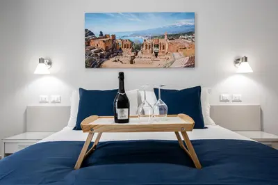 Letto o letti in una camera di Savio House