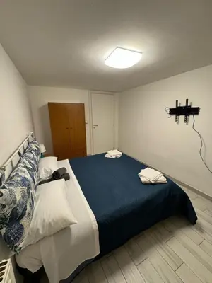 Letto o letti in una camera di Dimoretta house - Penthouse with a view of Mount Etna