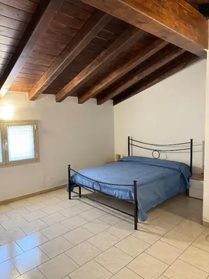 Letto o letti in una camera di Casa Marconi