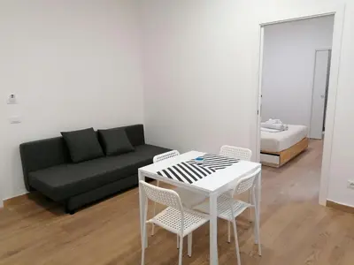 Letto o letti in una camera di Dell'Ova 98 Rooms