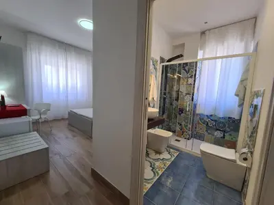 Letto o letti in una camera di B&B testa di Moro