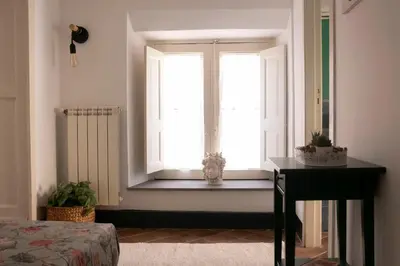 Letto o letti in una camera di Alessandro Manzoni Apartments - Exclusive brand 