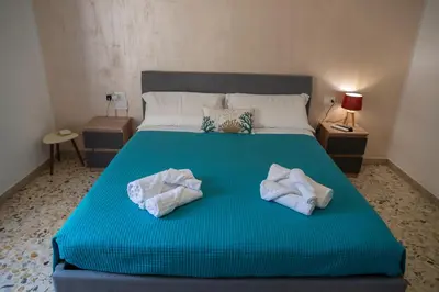 Letto o letti in una camera di Appartamento La Corsara