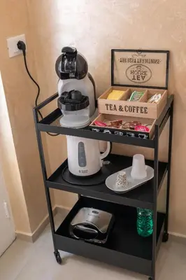 Set per la preparazione di tè e caffè presso Appartamento La Corsara