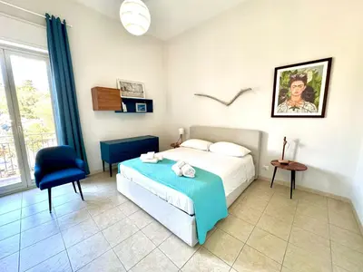 Letto o letti in una camera di CalmaHouse