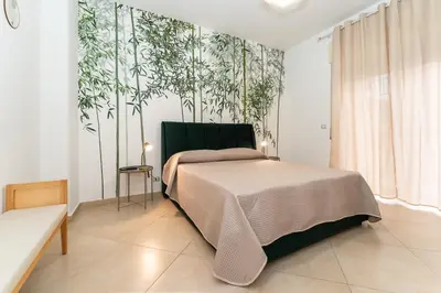 Letto o letti in una camera di Pretty House Catania Center