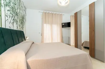 Letto o letti in una camera di Pretty House Catania Center