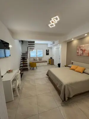 Letto o letti in una camera di Casa MaLù