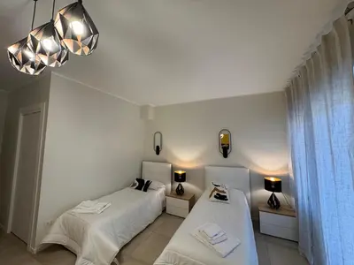 Letto o letti in una camera di Dimora dei Vespri 1