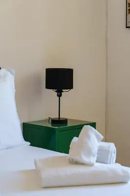 Letto o letti in una camera di Terrazza Lavica, free parking