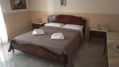 Letto o letti in una camera di A Casa di Sarina