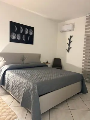 Letto o letti in una camera di The Cannizzaro Home